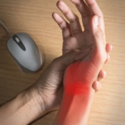 Woman hand got pain from using mouse. - Colorado Center of Orthopaedic Excellence Carpel Tunnel and Arthristis