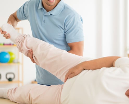 Personal physiotherapist rehabilitating joints - Colorado Center of Orthopaedic Excellence rehab after hip dislocation